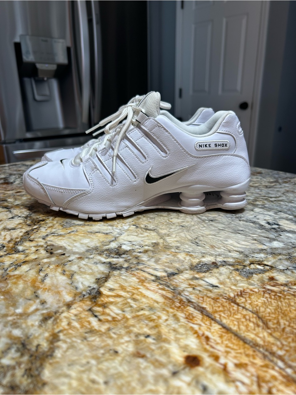 Nike White Shox Sneakers with Black Swoosh